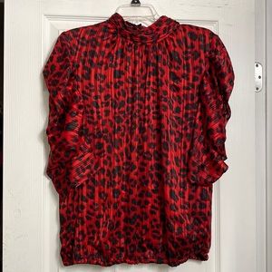 Red leopard print top.